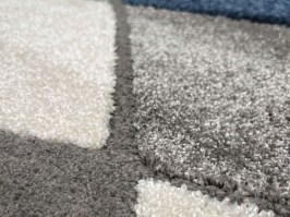 Dizaina paklājs ar ģeometrisku figūru laukumiem Cani 974 zils